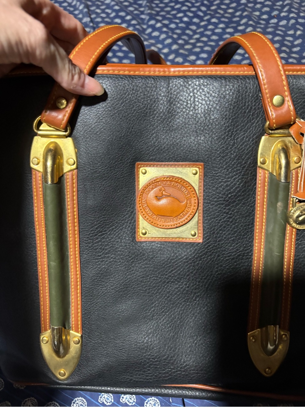 Dooney & Bourke Black Leather tote with Brown Trim and Brass Hardware